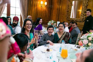 Wedding guests laughing