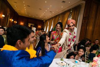 Wedding guests laughing