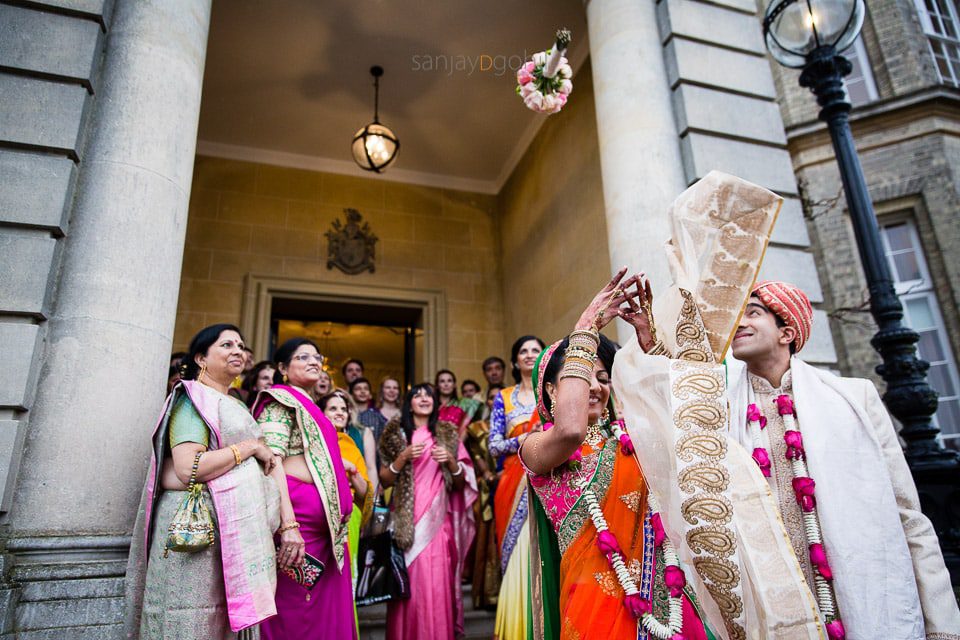 Bride throwing bouquet 