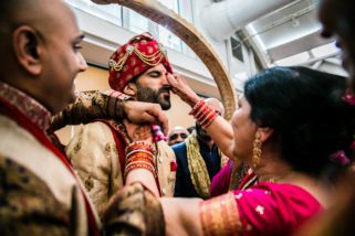 Groom's nose bring pinched