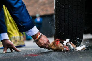 Coconut being crushed during Hindu wedding ceremony