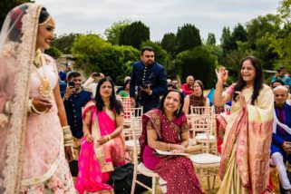 Hindu wedding bride arriving for wedding