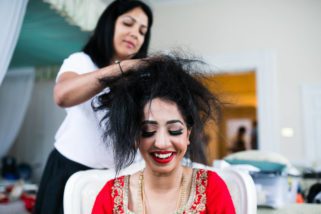 Roshni MUA getting bride ready for wedding