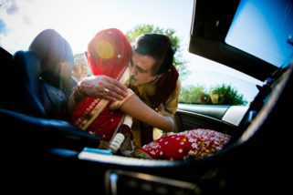 Father of the bride kissing daughter
