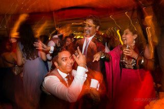 Guests dancing during wedding reception party at Savil Court, Windsor