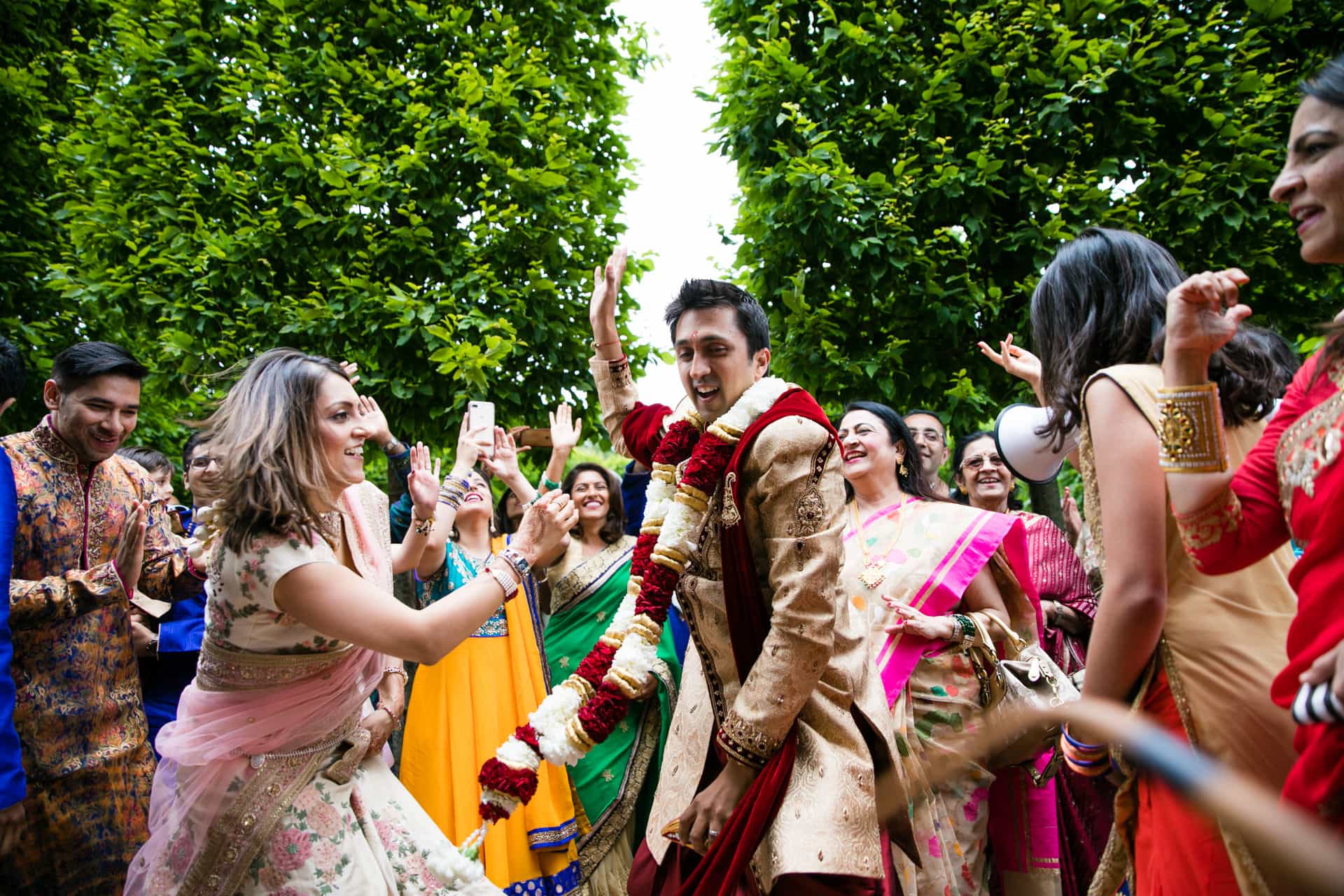 Groom's side arrival at wedding