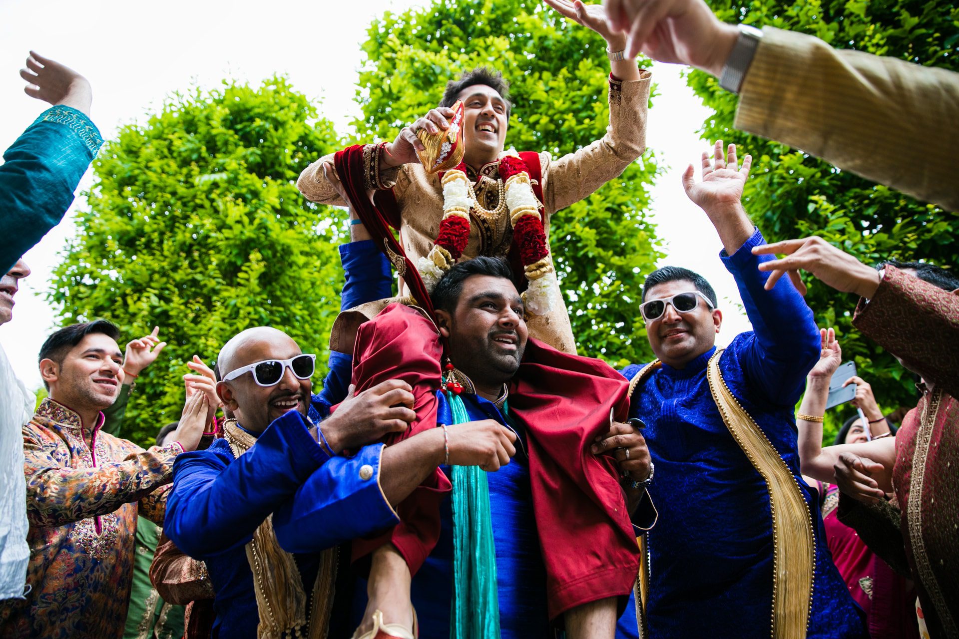 Groom's side arrival at wedding