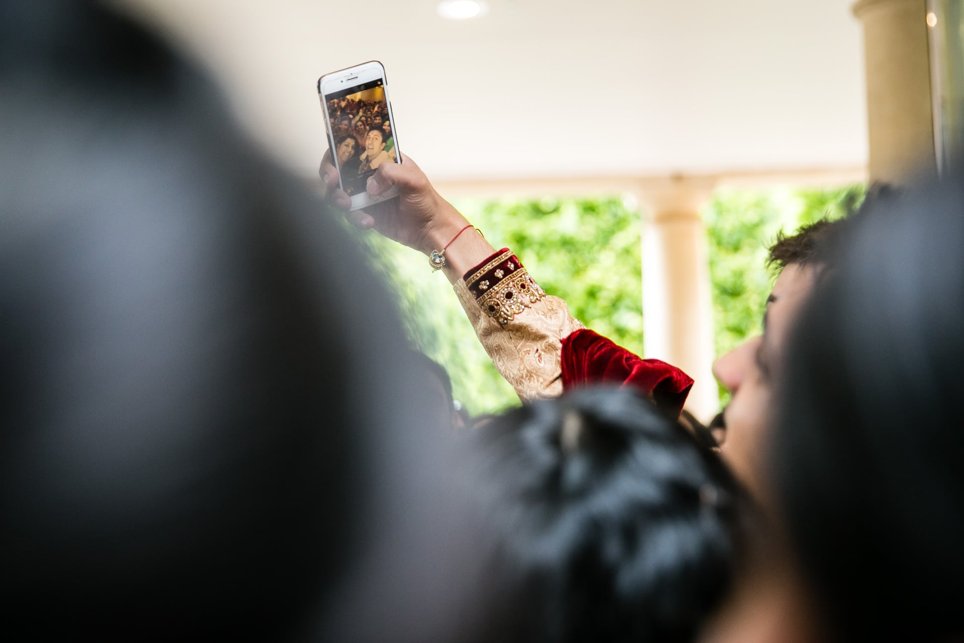 Groom taking selfie