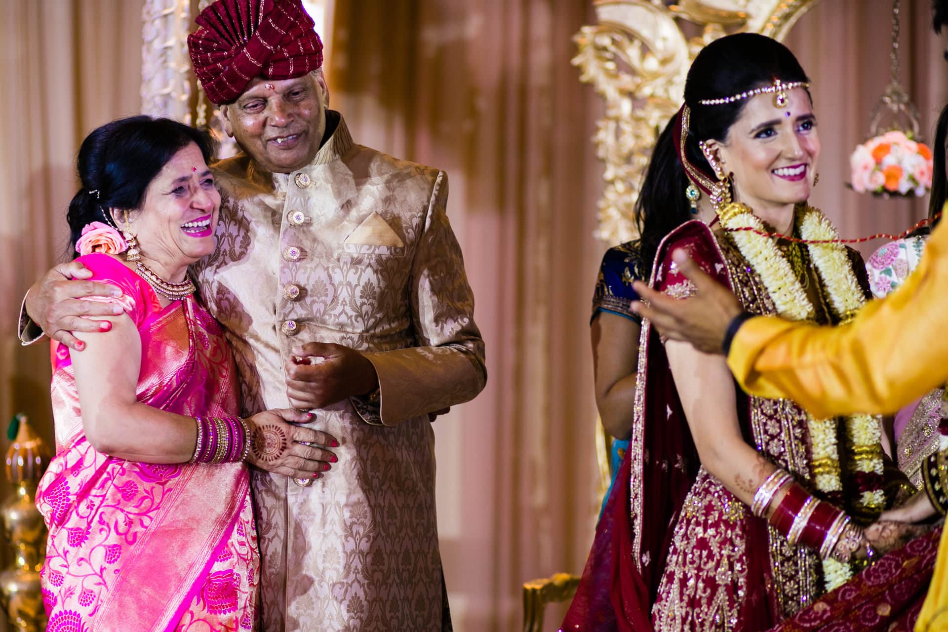 Bride's parents smiling