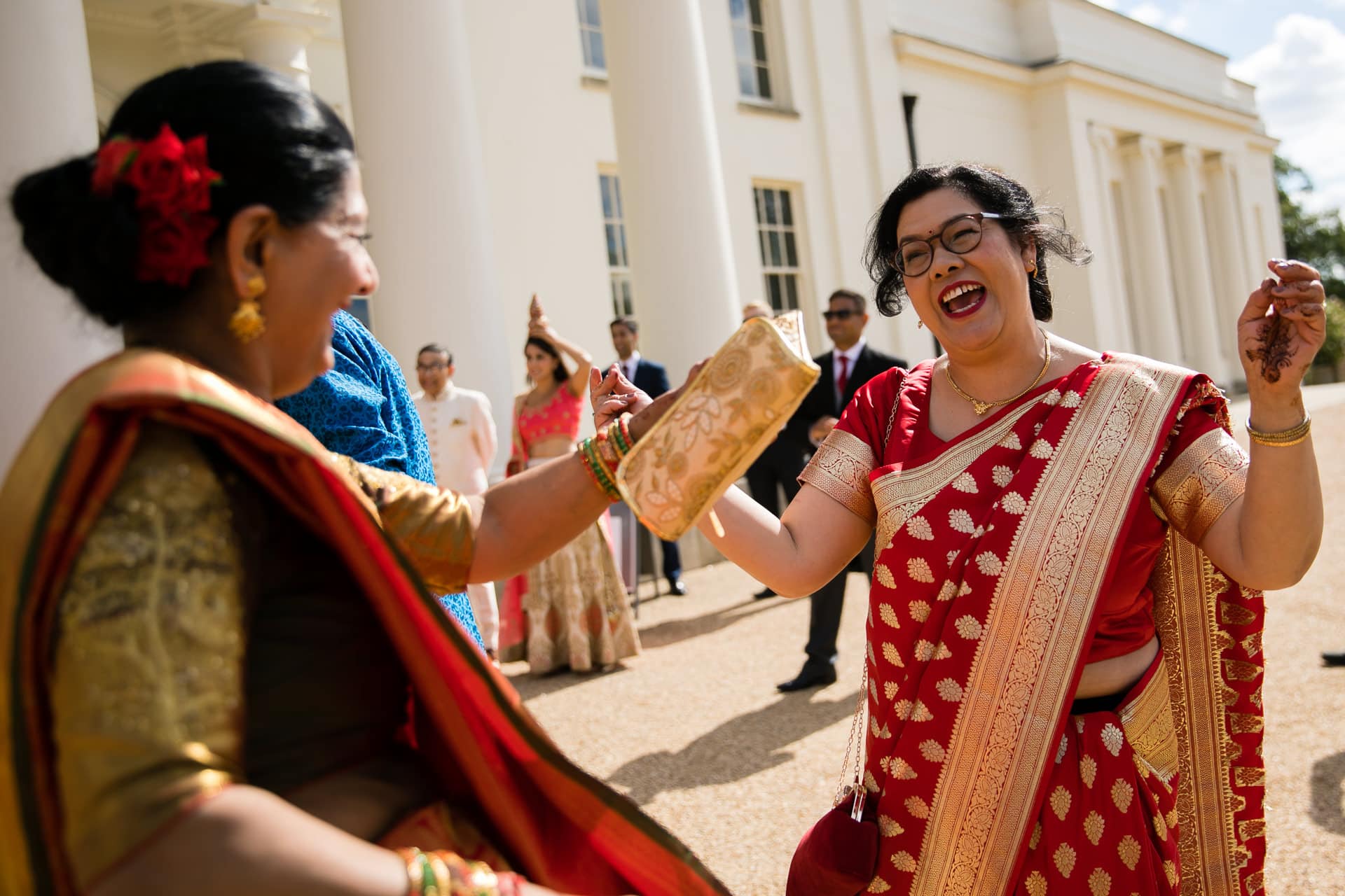 Mothers of bride and groom dancing