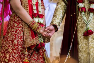 Bride and Groom holding hands
