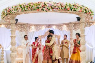 Bride and groom hugging