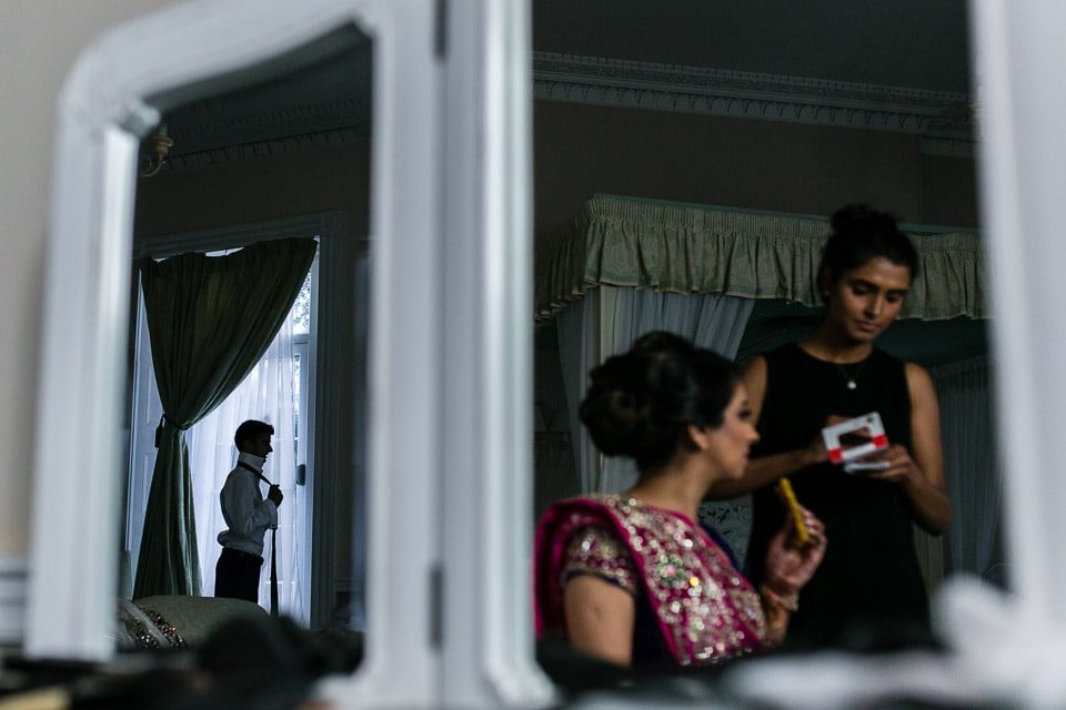 Asian Groom getting ready