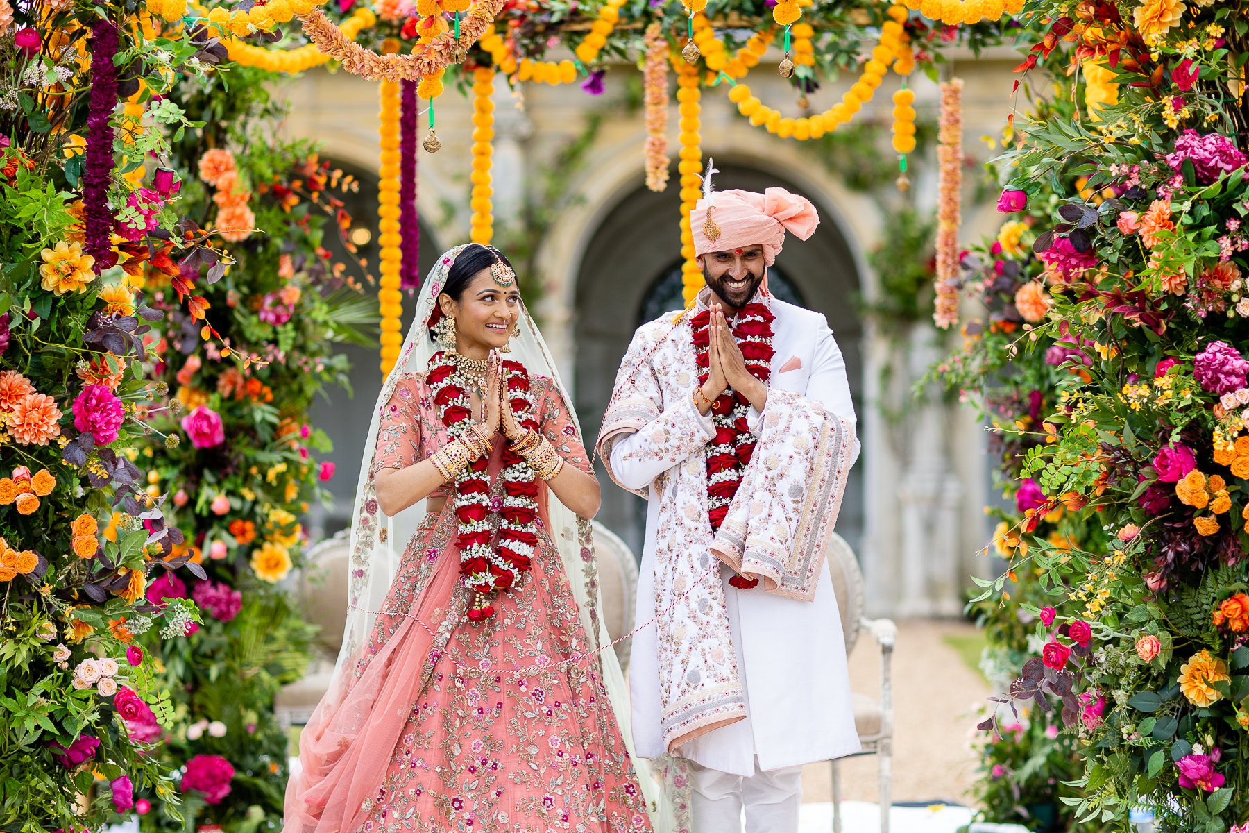 Hindu bride and groom smiling