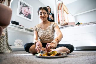 Asian bride eating