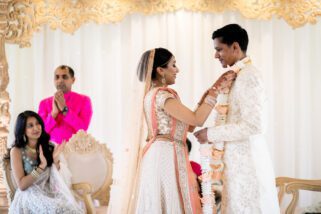 Bride and groom garlanding ceremony