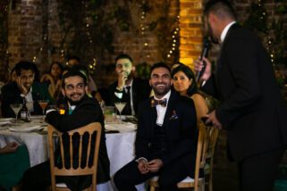 Wedding guests laughing