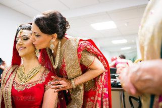 Mother of the bride kissing daighter
