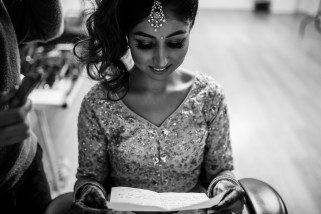 Asian Wedding Bride reading love letter