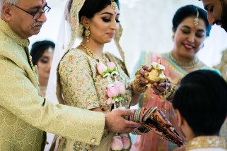 Bride's parents giving daughter away in marriage