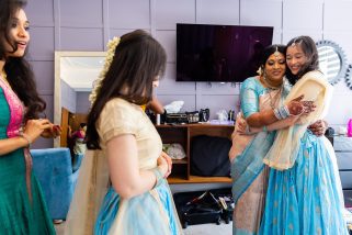 Bride hugging best friend