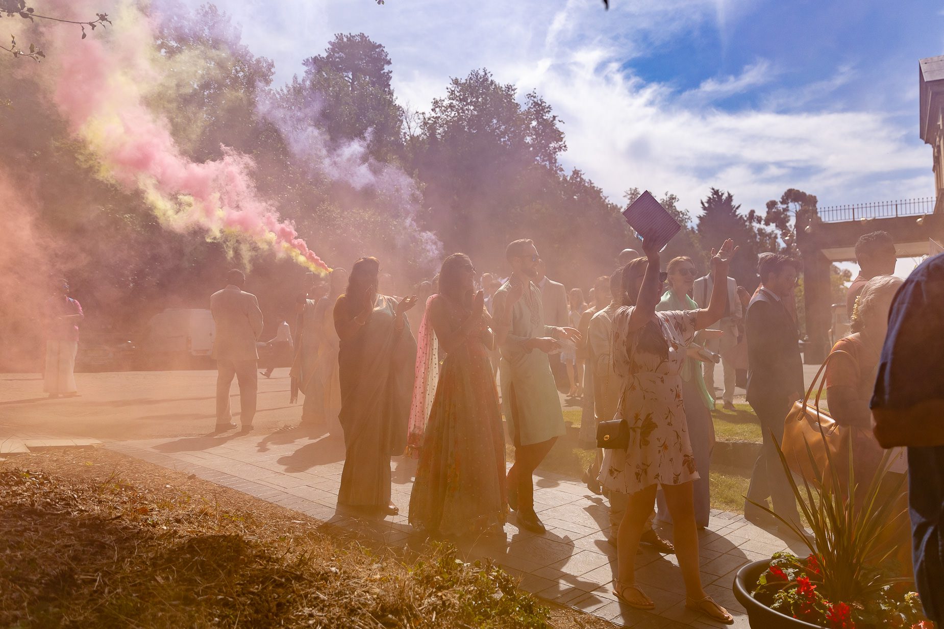 Smoke bombs being used for wedding procession
