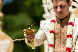 Wedding groom performing Hindu wedding ceremony