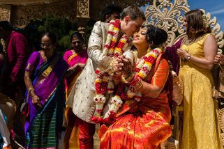 Bride and groom touch foreheads