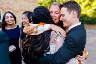 Wedding couple hugs
