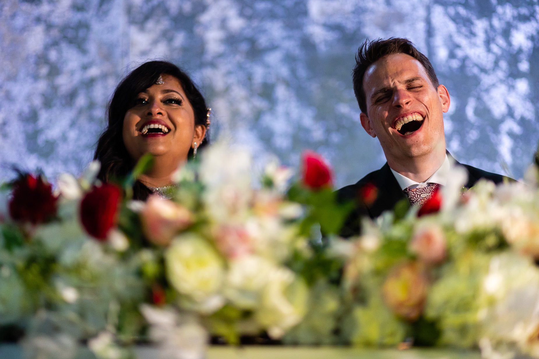 Bride and groom laughing