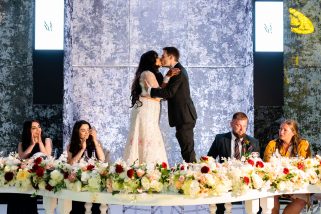Bride and groom kissing