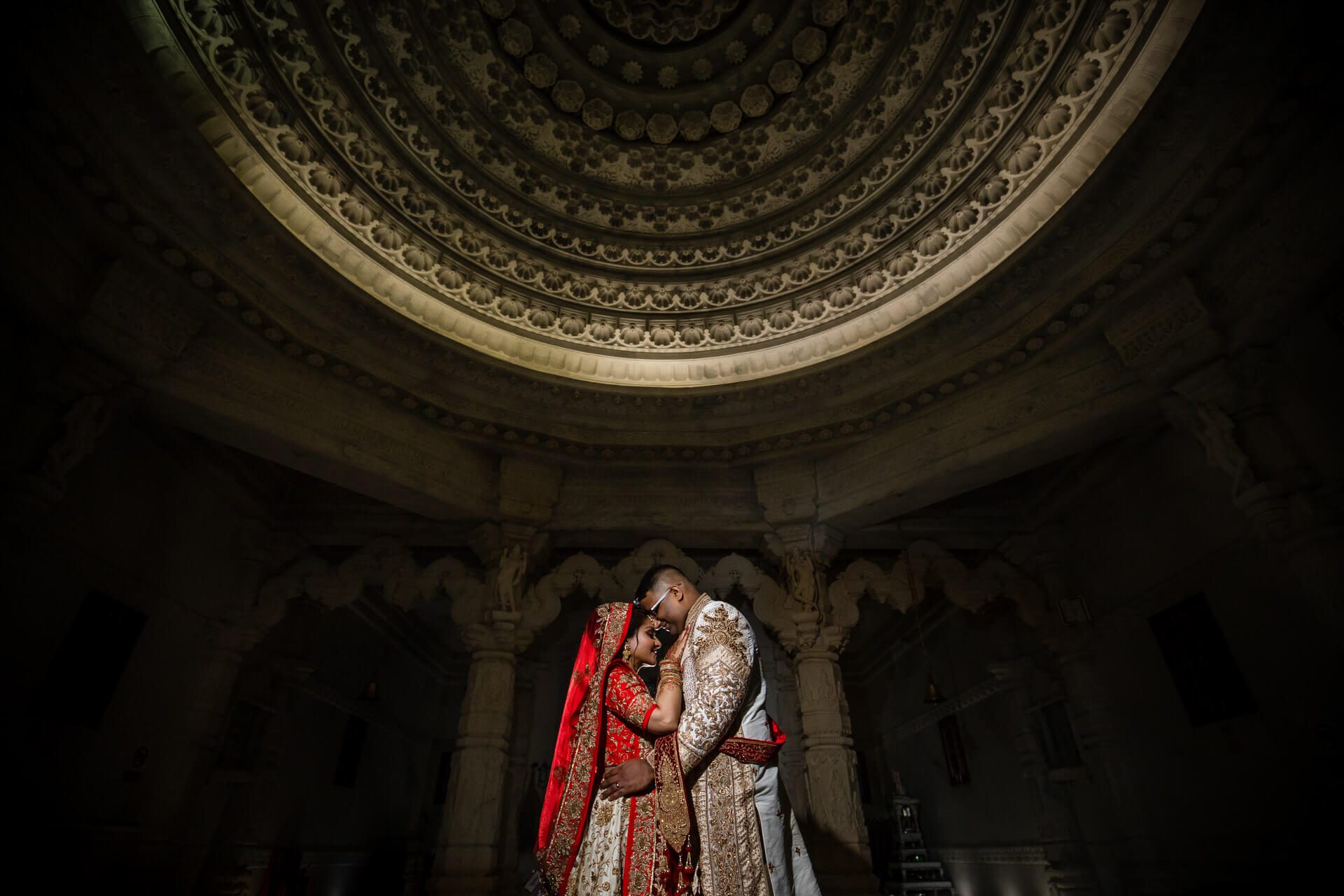 Wedding portrait inside Jain temple
