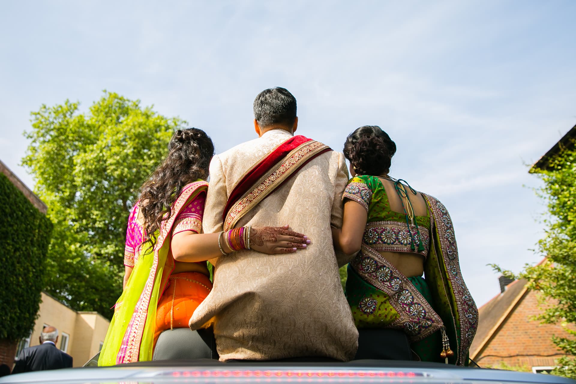 Asian wedding guests arriving for wedding ceremony