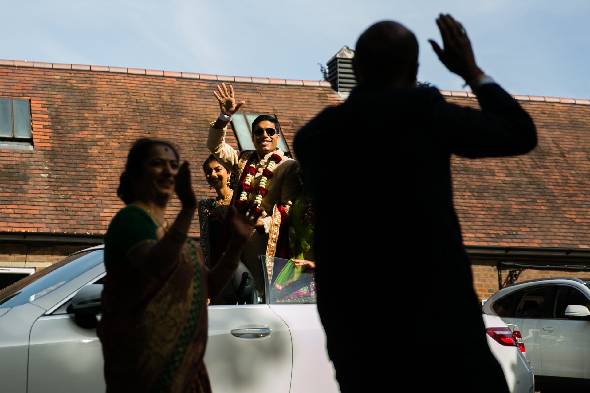 Asian wedding guests arriving for wedding ceremony