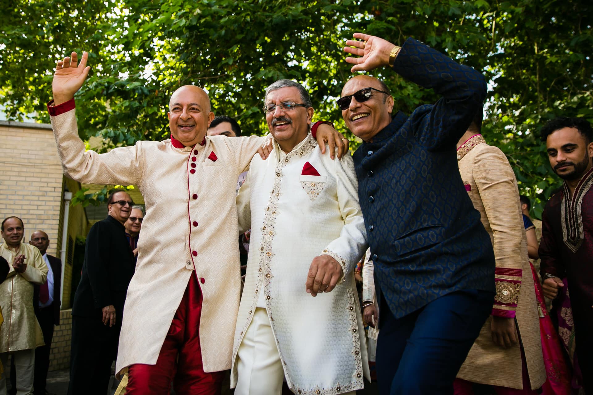 Asian wedding guests arriving for wedding ceremony