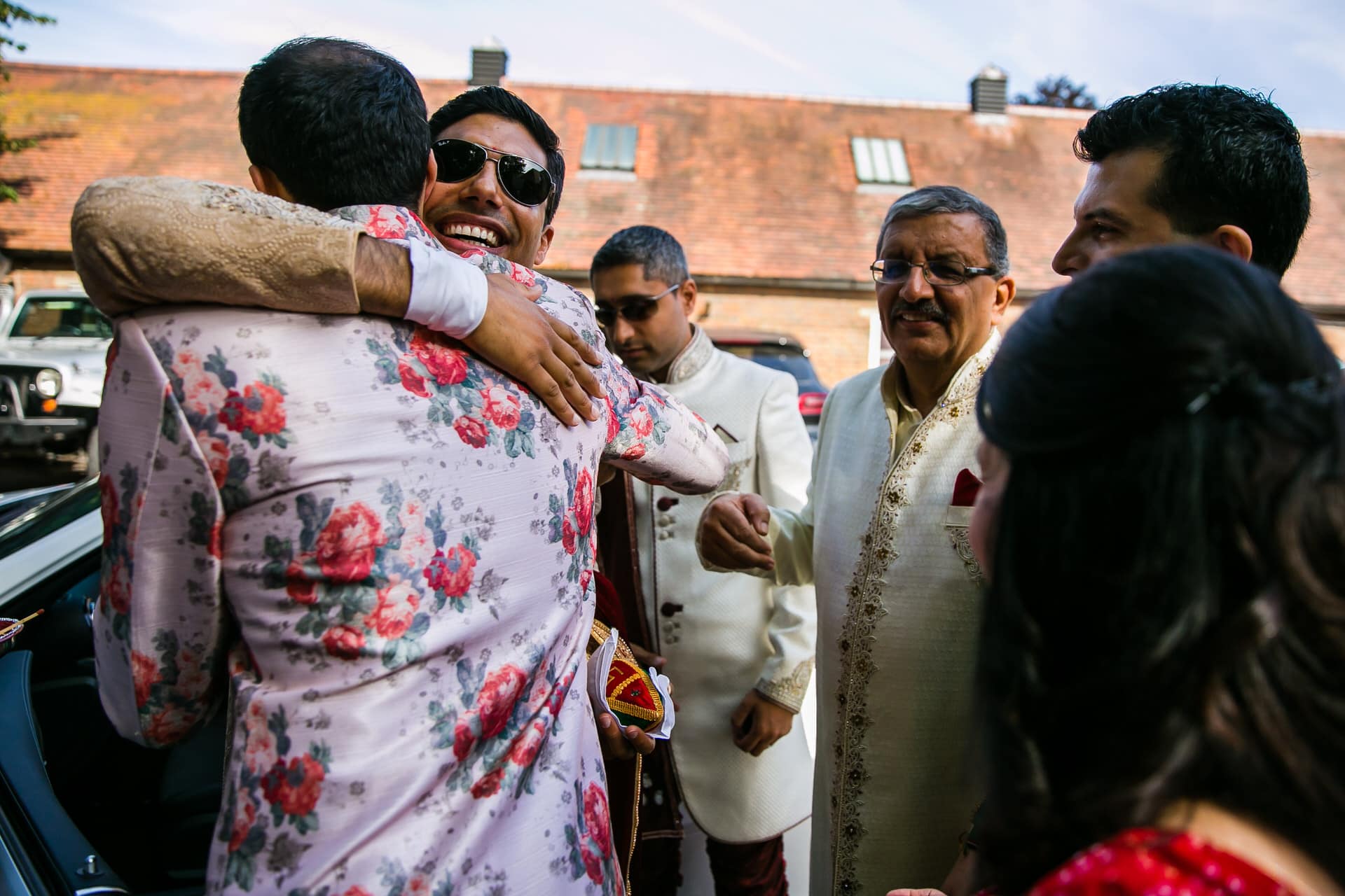 Wedding groom hugging