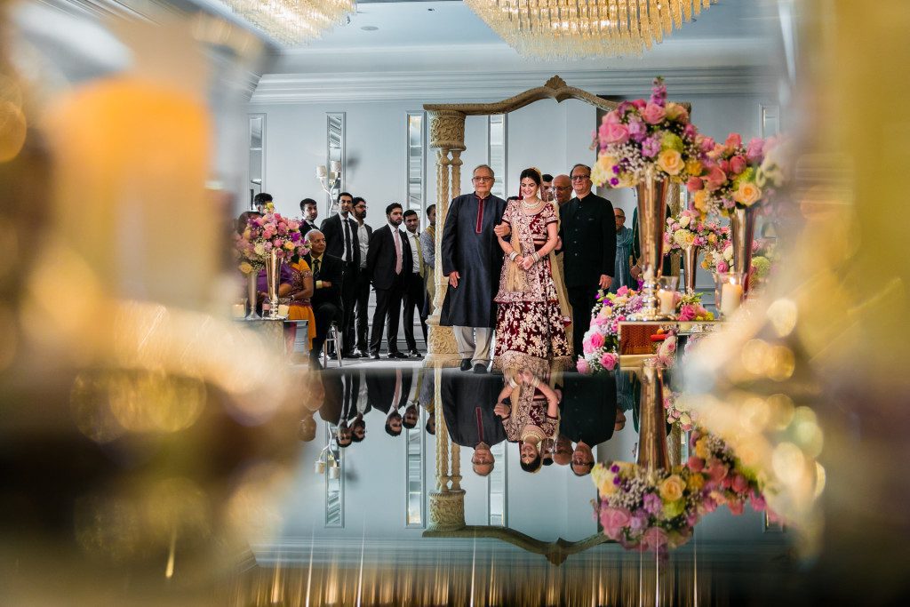 Indian wedding bride walking down the isle