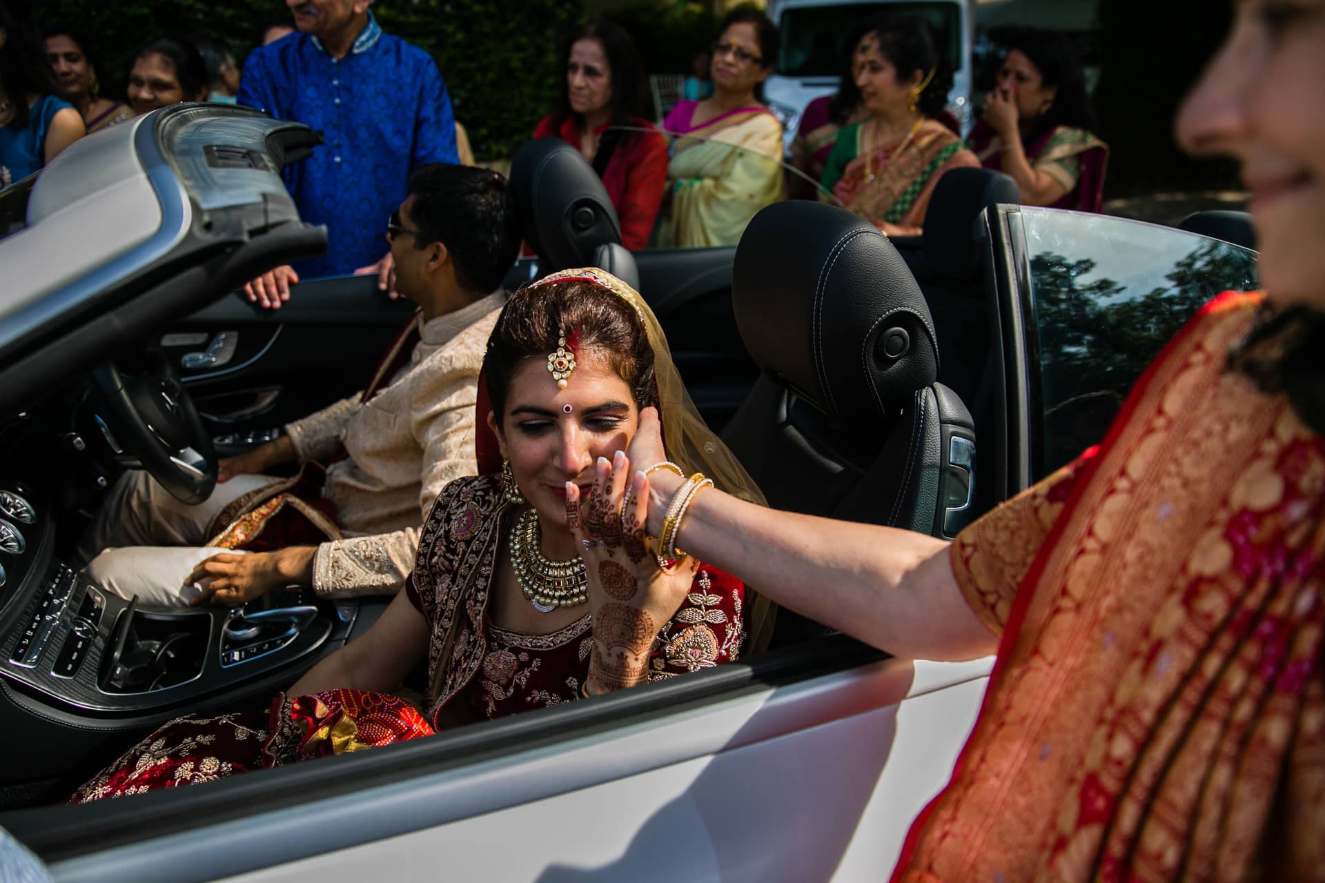 Bride kissing mother's hand