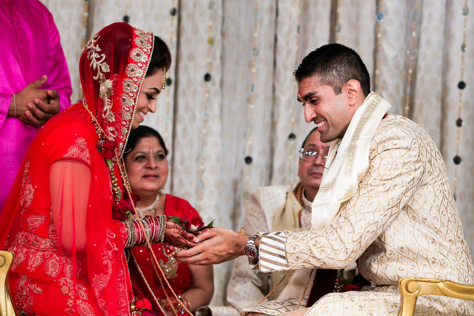 Smiling asian bride and groom during Hindu Wedding