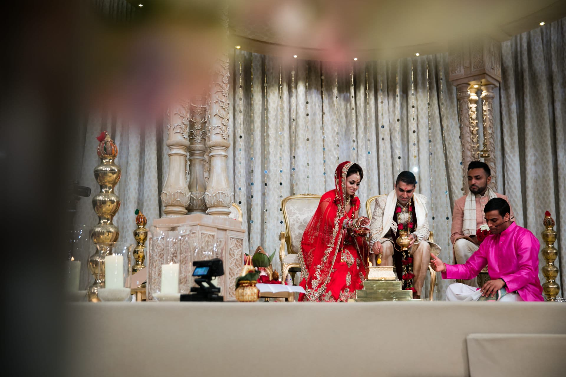 Hindu wedding couple performing Hindu wedding ceremony