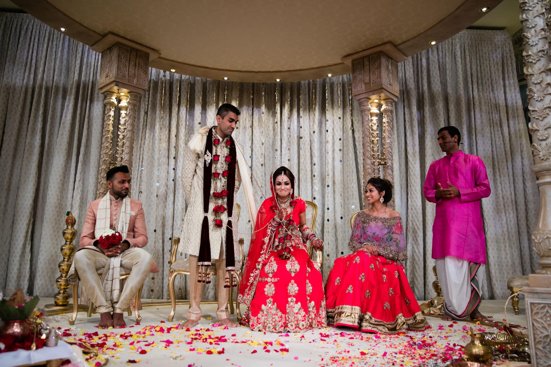 Hindu Bride sits down before the groom does