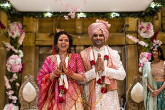 Asian Bride and Groom laughing