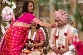 Groom's nose being pinched during Gujarati wedding