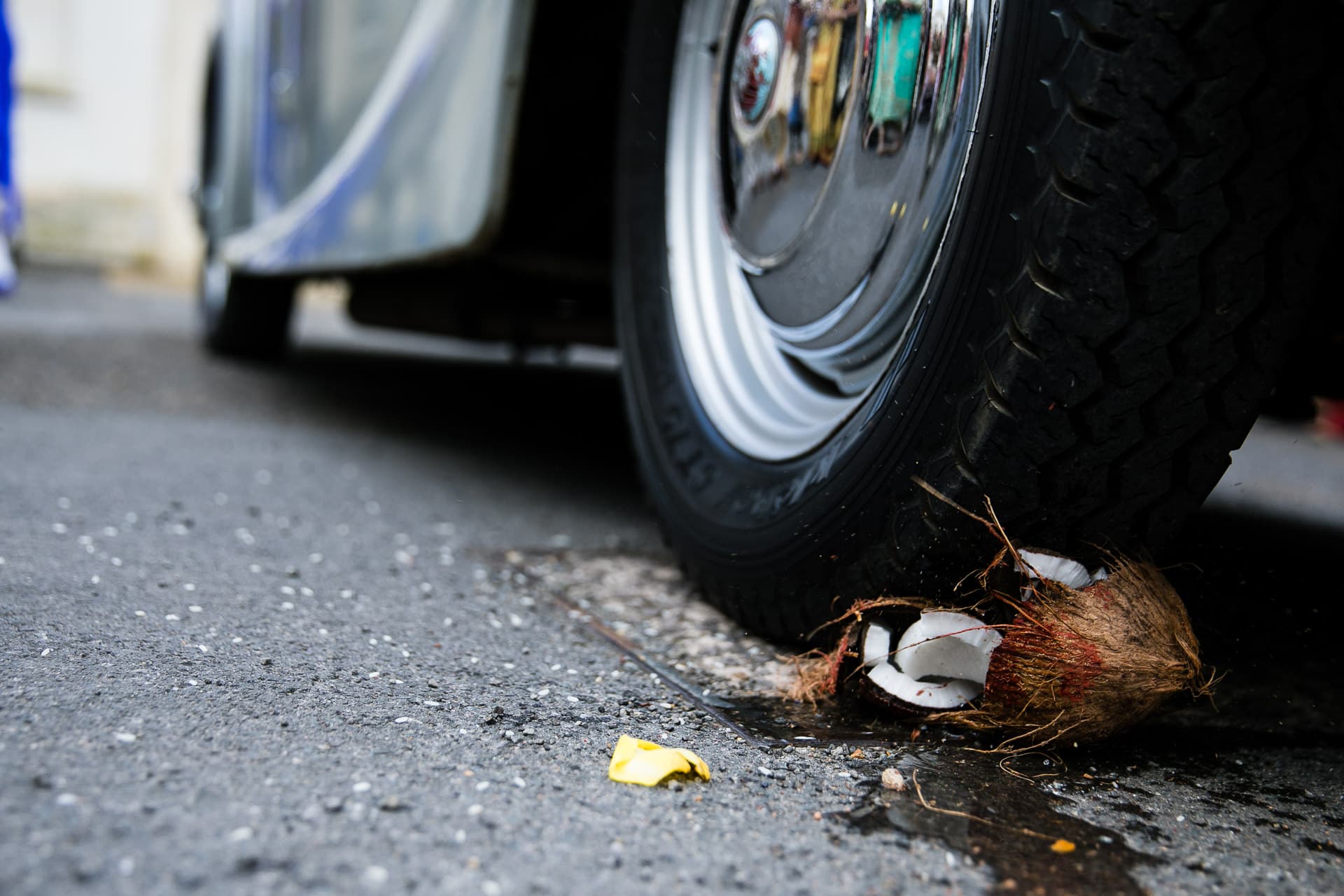 Wheel crushing coconut