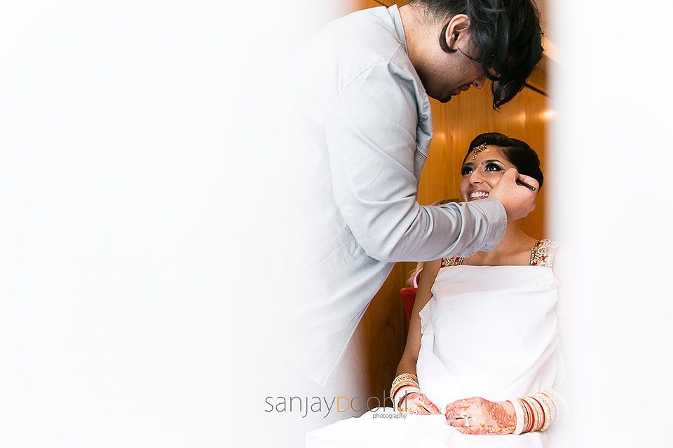 Hindu Bride getting ready by Jawaad Ashraf makeup artist