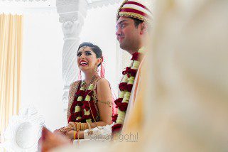 Asian Wedding bride laughing