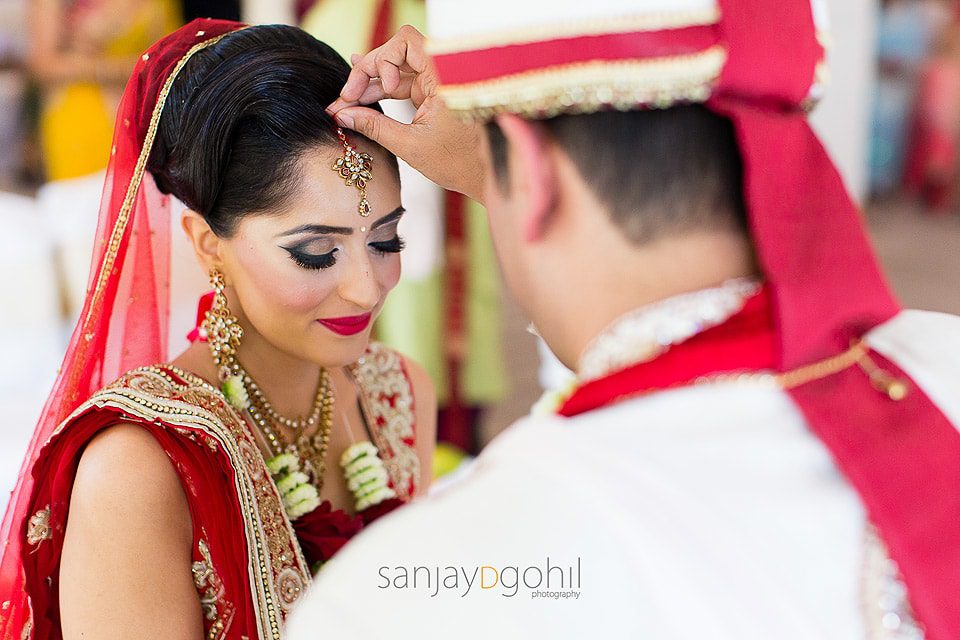 Sindoor being put onto Hindu Wedding Bride