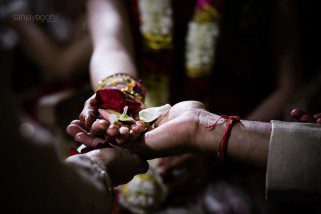 Closeup of hands during Kanyadhan ceremony