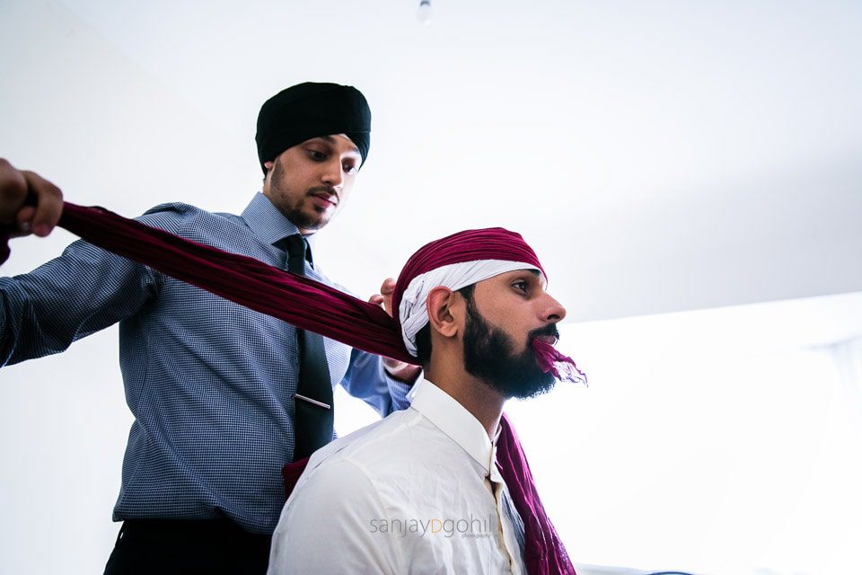 Asian Groom getting ready for wedding