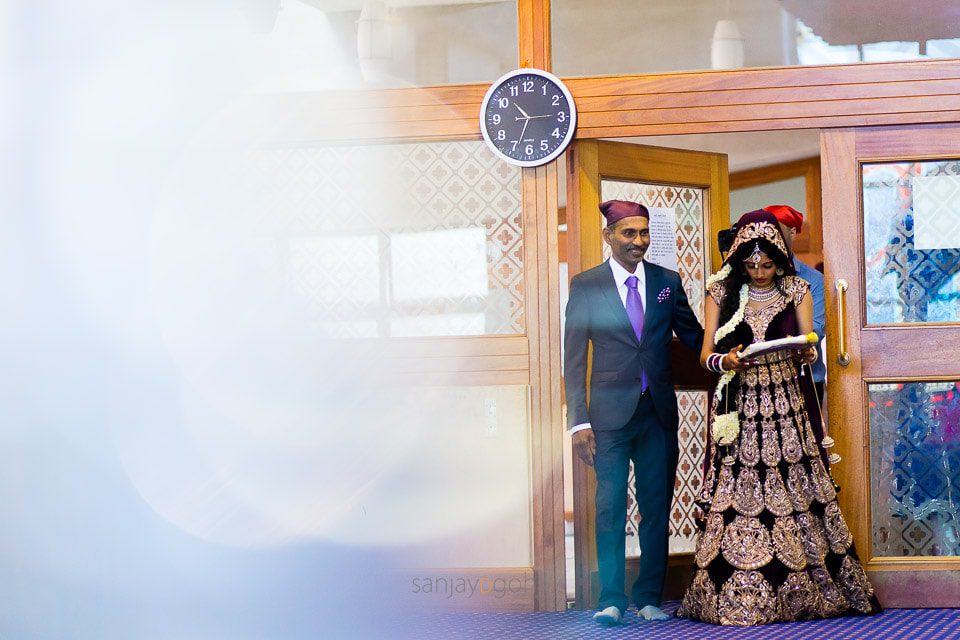 Bridal entrance during Sikh wedding ceremony